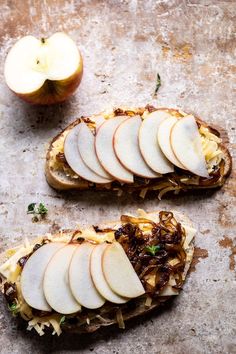 two pieces of bread with sliced apples on top