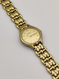 **AVAILABLE ON WWW.LAIA-AMANI.COM AT A LOWER PRICE** Dainty vintage gold tone Tissot watch, sophisticated and minimal perfect with any outfit.  In working order.  Has minor wear on, please see pictures.  Length: 17cm.  Dial width: 2.1cm. Elegant Gold Watches With Subdials, Small Gold Watch, Vintage Gold Watches, Vintage Woman’s Watch, Dainty Gold Watch Vintage, Vintage Gold Watch Women’s, Tissot Watches Women, Elegant Brown Watch With Tachymeter, Vintage Gold Watch