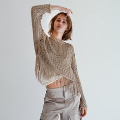 4331/050 New With Tags 100% Acrylic Long Sleeves And Fringe Openwork Knit Sweater With A Round Neckline Cropped Pointelle Knit Sweater, Bohemian Pointelle Knit Top For Fall, Cropped Open Knit Sweater For Layering, Cropped Beige Sweater For Spring, Cropped Textured Knit Beige Sweater, Beige Textured Knit Cropped Sweater, Bohemian Crochet Long Sleeve Top With Textured Knit, Winter Cropped Pointelle Knit Sweater, Beige Cropped Knit Sweater