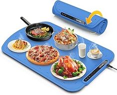 a blue tray with food on it and an electric heater attached to the side