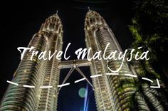 the words travel malaysia written in front of two tall buildings with palm trees around them