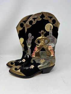 Here is a pair of fantastic statement boots! Very well made leather western cowboy boots made in Spain. Very lightly used. Novel iridescent leather made into a desert scene with cowboy, moon and cactus. Boots are marked Made in Spain Size 6M Western Gold Boots For Rodeo, Gold Leather Western Boots, Cactus Boots, Moon Cactus, Statement Boots, Desert Scene, Cowboy Cowgirl, Western Leather, Cowboy And Cowgirl