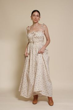 Brand: In Loom Floral print maxi dress with tie straps and side pockets. ♡ Details Color: Vintage Cream Tie straps Lightly smocked bodice Side pockets Partially lined 97% Cotton, 3% Polyester | Lining: 100% Rayon Hand wash recommended Size & Fit Model info: Height 5'3"| Bust 32"| Waist 25"| Hips 34" Model is wearing a size small Fit: Relaxed fit Stretch: Bodice of dress has stretch Measurements: S: Bust 31" | Length 51.5" M: Bust 33" | Length 52" L: Bust 35" | Length 53" Dress With Tie Straps, Pockets Details, Knit Outerwear, Knit Denim, Floral Print Maxi Dress, Floral Print Maxi, Color Vintage, Sleeveless Bodysuit, 20's Dress