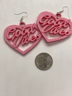 Good Vibes 3D Printed Earrings, These 3D Printed earrings are super lightweight and come in a variety of color options. They are made with biodegradable filament. If you need a different hook, be sure to include that when placing your order!! Thank You! :D ----Select your base color in the option selection. The default for the earrings will be all the BASE COLOR! If you would like to customize the letters to be a different color such as black, white, etc let me know when placing your order!!  ----Also, be sure to select the CORRECT color you want for the earring! I will print what is selected :) ----Want your earrings to have some resin with glitter? Maybe a clear gloss to add some shine or a glossier finish? Or do you want to GLAM up your earrings with some rhinestones? If you want to add Trendy Valentine's Day Hoop Earrings, Trendy Dangle Plug Earrings As Gift, Trendy Dangle Plug Earrings For Gift, Trendy Plug Earrings As Gift, Customized Trendy Pink Jewelry, Trendy Pink Plug Earrings As Gift, Trendy Personalized Adjustable Earrings, Funky Pink Earrings For Gift, Trendy Adjustable Heart-shaped Earrings