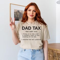 "Funny Dad Definition Shirt, Dad Tax Shirt, Tax Noun Shirt, Fathers Day Gift, Best Father Tee,Dad Tax Shirt,Papa Tax,Dad Gifts ,Grandpa Shirt Our T-shirts are made from premium materials and printed using advanced technology to ensure exceptional quality and comfort. Features: Premium brand: Gildan Soft Style Professionally printed using advanced technology Unisex size for a comfortable fit Made from soft, breathable cotton for all-day comfort Durable construction to withstand repeated wear and tear Easy Ordering: 1.Browse our design options. 2.Choose your size and color. 3.Choose the quantity you want. 4.Click \"Add to Cart\" to complete your purchase. Order Fulfillment: 💍Production time: 1-2 business days 💍Shipping time: 3-5 working days after production Return Policy: 💍Returns and ex Dad Definition, Definition Shirt, Best Father, Grandpa Shirt, Head Shots, Purchase Order, Premium Brand, Dad Gifts, Dad Humor