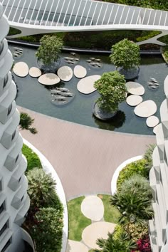 an aerial view of the gardens and walkways at marina bay in singapore, taken from above