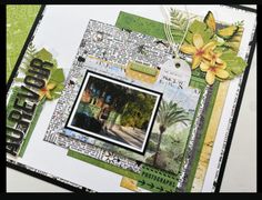 a close up of a scrapbook page with flowers and trees in the back ground