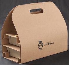 an open cardboard box with three compartments on the bottom and two shelves at the top