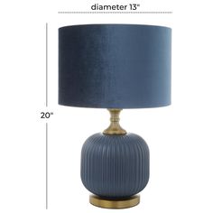 a blue table lamp with measurements for the base