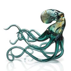 an octopus sculpture sitting on top of a white surface