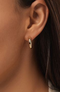 These small chunky gold hoop earrings are your daily dose of glam, made with 100% recycled solid gold. Whether you're conquering a work meeting or hitting the dance floor, you'll never want to take these beauties off and you don't have to. Pair with our Gold Paperclip Necklace to bring your solid gold look together. Waterproof, tarnish-proof recycled solid gold Revamp your go-to earring stack with a gold & bold touch Perfect for stacking or wearing on its own Width: 17.9mm - 0.7" Depth: 4mm - 0. Earrings One Hole, Gold Paperclip Necklace, Earring Stack, Chunky Gold Hoop Earrings, Paperclip Necklace, Work Meeting, Anniversary Sale, The Dance, Gold Hoop