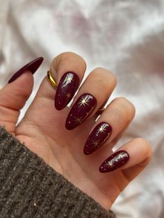 In this guide, we’ll explore 30 stunning fall nail designs that will inspire your next manicure. From trending colors for 2024 to elegant designs perfect for any occasion, these ideas will help you stay on top of the latest trends while expressing your unique style. Let’s dive into the world of autumn nails and discover the best looks for this season! ...  . Holiday Nails Dark Red, Red Nails Gold French Tip, Winter Nails Stars, Gold And Burgundy Nail Designs, Deep Red Holiday Nails, Christmas Maroon Nails, Maroon And Gold Nail Ideas, Christmas Nail Trend 2024, Christmas Star Nail Art