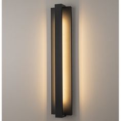 a wall light that is on the side of a wall