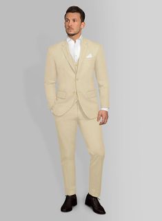 A sophisticated suit even when the heat is trying its very best to have the opposite effect. Crafted from cotton lycra, the beige hue of the Italian Sand Beige Cotton Stretch Suit can do wonders while the lightness of the material will make it an ideal choice when the temperature rises.   Look Includes  Italian Sand Beige Cotton Stretch Fabric  Two Button Jacket Style  Notch Lapel  Corozo Beige Buttons  Single Vent  Three Cuff Buttons  Two Welted Back Pockets on Trousers   You can change the loo Classic Beige Single-breasted Set, Elegant Cotton Wedding Suit, Elegant Wedding Cotton Suits, Beige Tailored Notch Lapel Sets, Beige Tailored Set With Notch Lapel, Classic Beige Set With Suit Collar, Beige Slim Fit Single Breasted Suit, Fitted Beige Business Suits, Classic Beige Sets With Suit Collar