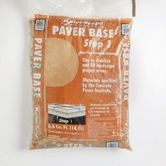 a bag of paper base is sitting on the wall