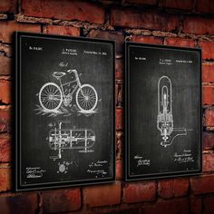 two black and white prints on a brick wall, one with a bicycle in the middle