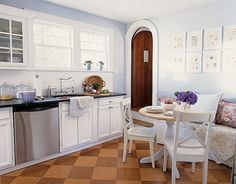 the kitchen is clean and ready to be used as a dining room or living room