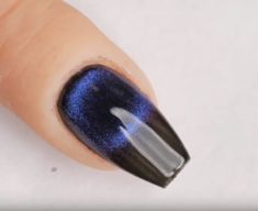 In this video, Paola Ponce demonstrates how to create a black hole nail design using 9D cat eye magnetic gel-polish. 9d Cat Eye Nails, Cat Eye Nails Black, Golden Nail Art, Graffiti Nails, Blue Nail Color, Pop Art Nails, Business Nails, Nail Store, Golden Nails