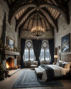 a large bedroom with a fireplace and chandelier