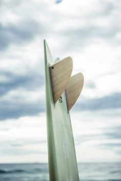 a surf board sticking out of the water