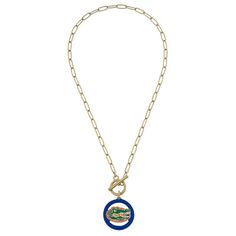 a necklace with a florida gator logo on it and a chain around the neck