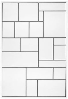 a black and white photo of a brick wall with squares on the bottom, as well as lines in the middle