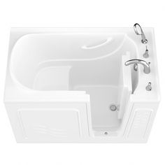 a large white bath tub sitting on top of a white floor