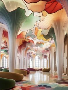 an artisticly designed lobby with colorful ceilinging