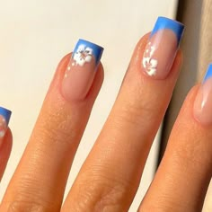 Create a classic look with these French tip nail art designs! 💅👀 #NailArt #FrenchTip Blue French Tips Hibiscus, Blue French Tip Hibiscus Nails, Blue French Tip With Hibiscus Flower, Nail Inspo Acrylic Blue, Hibiscus Flower Nails Square, Blue Hibiscus Flower Nails, Dark Blue Flower Nails, Summer Nail Ideas Gel, Nails Design Ideas Summer