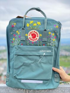 Welcome to my store and choose the perfect hand-embroidered fjallraven kanken backpack   Version & Size + Medium size: 38x27x13cm  + Big size: 42x32x13cm  - Product price includes: hand-embroidered fjallraven kanken backpack and design as shown in the picture - I can make fjallraven kanken backpack hand embroidery patterns according to your ideas - fjallraven kanken backpack will be hand embroidered with thread that won't fade when washed - fjallraven kanken backpack has a small front compartmen Spring Embroidered Backpack, Kanken Classic, Star Embroidery, Cute Embroidery, Classic Backpack, Hand Embroidery Patterns, Kanken Backpack, Custom Embroidery, Fjallraven Kanken