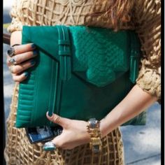 Emerald green clutch- this shows some of my personal style. I love to add pops of color into a simple outfit through accessories. My go-to items are usually colored purses or shoes. Green Clutches, Oversized Clutch, Green Handbag, Party Purse, Chic Bags, Handbag Outlet, Handbags Online, Handbags Michael Kors