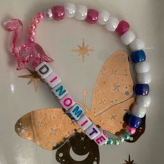 Brand New. One Of A Kind. Has A Pink Dinosaur With Beads That Sparkle Different Colors In The Light. Great For Edm, Plur, Rave, Plur, Vsco, Y2k, Kawaii, Positivity, Zen, Yoga, Meditation, Affirmations, Ocean, Nautical, Beach, Journey, Growth, Healing, Spiritual, Self Love, Self Care, Hippie, Gypsy, Boho, Bohemian, Hippie, Gypsy, Animal, Iridescent, Colorful, Bright, Nature, Ab Kidcore Kandi Bracelets, Kandy Braclets, Kawaii Positivity, Spiritual Self Love, Rave Core, Dinosaur Bracelet, Rave Kandi Ideas, Kandi Jewelry, Rave Candy