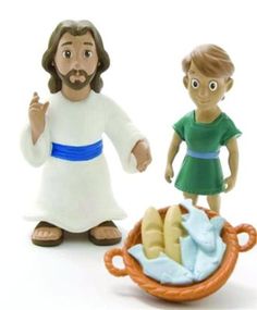 two figurines of jesus and baby jesus