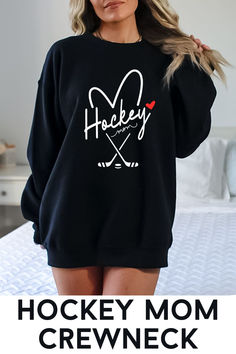 Make your mark as a proud hockey mom and stay warm in chilly arenas. 

Join the ranks of hockey moms who have already made this sweatshirt their go-to choice for comfort and style. Don't miss out on being a part of this exclusive community. Experience the warmth, quality, and style that our Hockey Mom Sweatshirt has to offer. Hockey Mom Sweatshirt, Hockey Mom Gifts, Hockey Sweatshirts, Cricket Ideas, Hoodie Ideas, Diy Sweatshirt, Photo Insta, Mom Stuff, Tshirt Ideas