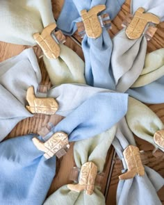 several pieces of cloth with wooden decorations on them