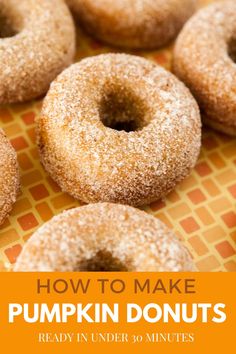 there are many donuts on the table with text overlay that reads, how to make pumpkin donuts ready in under 30 minutes