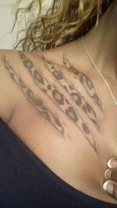 a woman's chest with an animal print on it