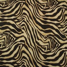 an animal print fabric with black and white stripes