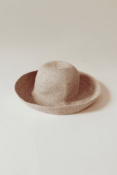 Whether you're attending rowing regattas, enjoying summer picnics, or leisurely drifting down the river, our woven raffia straw hat is the perfect companion. Featuring a timeless dome boater style with a charming flipped edge, it effortlessly combines elegance with a laid-back vibe. This is the epitome of the relaxed yet refined look we're all embracing this year. COUTONIC VINTAGE COLLECTION The COUTONIC Vintage Collection is not just a fashion collection; it's a sustainability-conscious homage Curved Brim Boater Hat For Beach Season Picnic, Curved Brim Panama Hat For Beach Season Picnic, Curved Brim Boater Hat For Beach Picnic, Short Brim Hat For Picnic Vacation, Beach Season Panama Hat For Picnic With Curved Brim, Wide Brim Straw Boater Hat For Vacation, Adjustable Straw Boater Hat For Picnic, Flat Brim Straw Hat For Beach Season Picnic, Vacation Wide Brim Straw Boater Hat