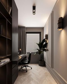 a room with a desk, chair and bookshelf next to a plant in the corner