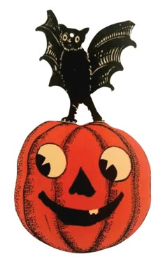 a halloween pumpkin with a bat on top