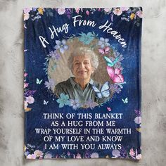 an old woman's photo on a blue background with flowers and butterflies in the frame