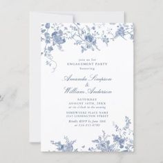 a wedding card with blue flowers on it