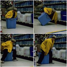 a man in yellow shirt and black pants holding a blue container