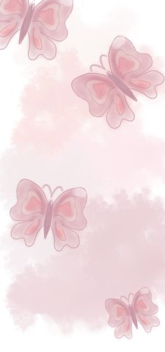 three pink butterflies flying in the sky