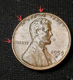 an image of a penny with arrows pointing to it