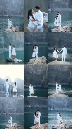 two people standing next to each other in front of water with rocks and mountains behind them