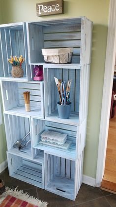 the shelves are made out of wood and have baskets on them