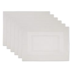 six white placemats on a white background