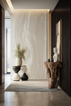 two vases are sitting on the floor in front of a wall with wood paneling